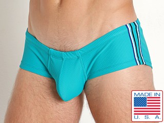 Model in teal Rick Majors Waverunner Nylon Rib Swim Trunk