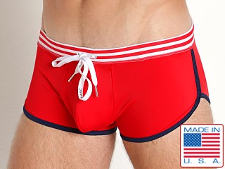 Model in red LASC Cruiser Swim Trunk