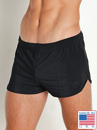 Model in black LASC Riptide Nylon Rib Swim Shorts