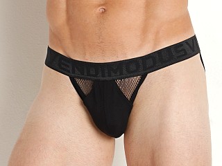 Model in black Modus Vivendi Mesh Tanga Sports Brief