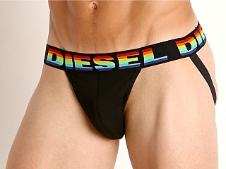 Model in black Diesel Limited Edition Rainbow Jocky Jockstrap