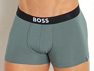 Model in teal Hugo Boss Identity Trunk