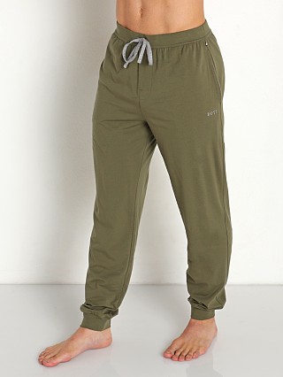 Model in olive Hugo Boss Mix & Match Pants