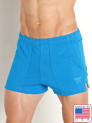 Model in turquoise LASC Cotton Stretch Workout Shorts