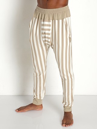 Model in striped sand Modus Vivendi L.A. Prayer Drop Crotch Leggings