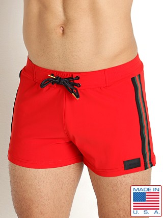 Model in red Sauvage Malibu Retro Lycra Swim Short