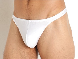 Model in white Modus Vivendi Original Swim Thong