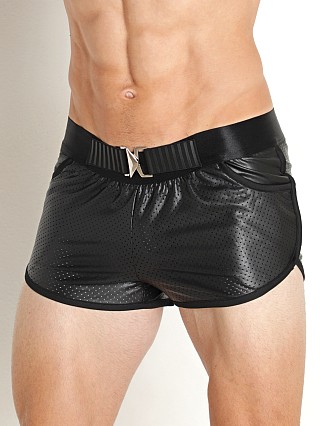 Model in black STUD Cannon Perforated Rubber-Look Short