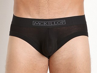 Model in black McKillop Max Bulge Modal Brief with C-Ring