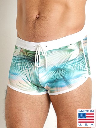 Model in pastel palms LASC Square Cut Swim Trunk