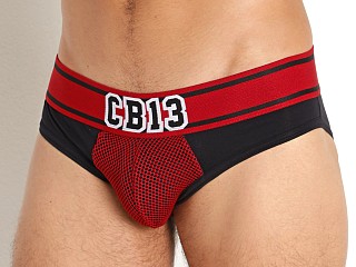 Model in burgundy Cell Block 13 Halfback Mesh Pouch Brief