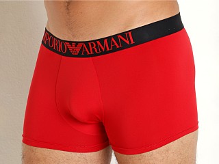 Model in red Emporio Armani All Over Eagle Microfiber Trunk