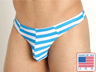 Model in malibu blue Go Softwear Cabana Stripe Swim Thong