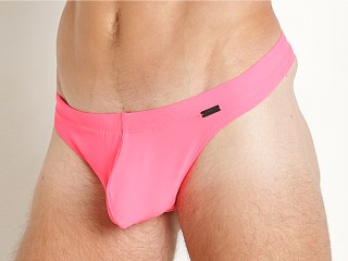 Model in neon coral Ergowear X4D Swim Thong