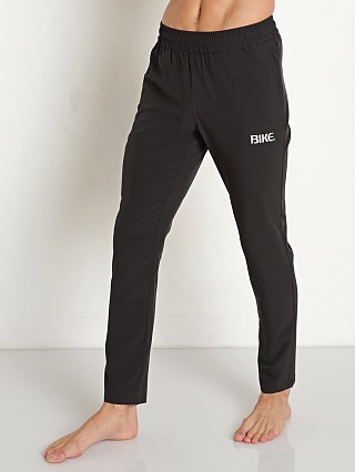 Model in black Bike Logo 4-Way Stretch Active Pant