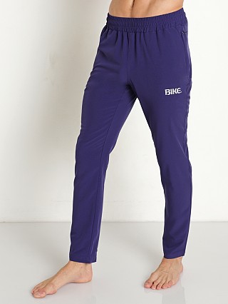 Model in rhodonite blue Bike Logo 4-Way Stretch Active Pant Black