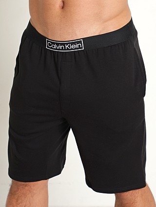 Model in black Calvin Klein Reimagined Heritage Sleep Short