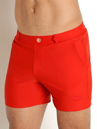 Model in rust 2EROS Bondi Swim Shorts