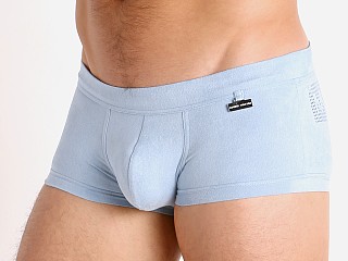 Model in light blue Modus Vivendi Vegan Suede Laser Cut Trunk