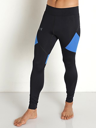 Model in black/blue/reflective Under Armour Speedpocket Running Tights