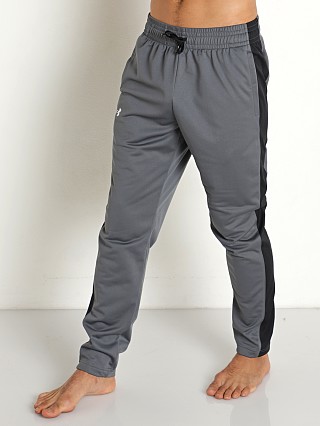 Model in pitch gray Under Armour Brawler Pants