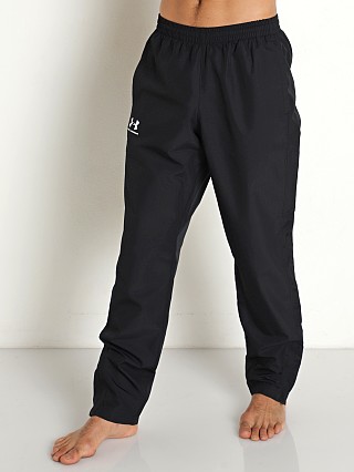 Model in black Under Armour Vital Woven Pants