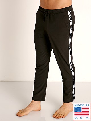 Model in black Sauvage Woven Lycra Athletic Pants