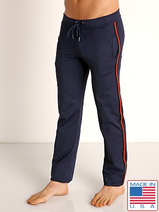 Model in navy Sauvage Tactel Nylon Low Rise Workout Pants