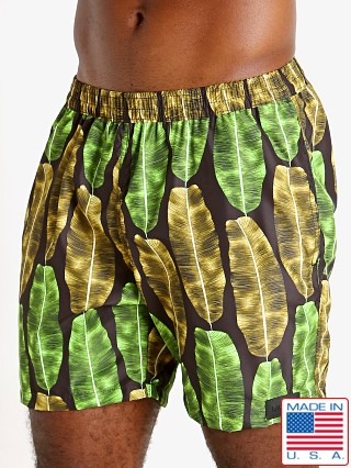 Model in banana leaf print Sauvage 17" Pull-On Surf Trunk