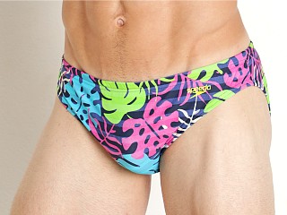 Model in green gecko Speedo Cali Palm Solar 1" Swim Brief