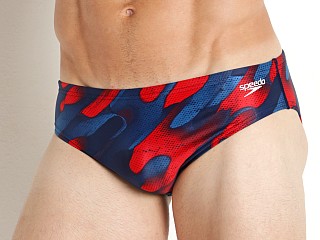 Model in red/white/blue Speedo Powerflex Natural Wonder Swim Brief