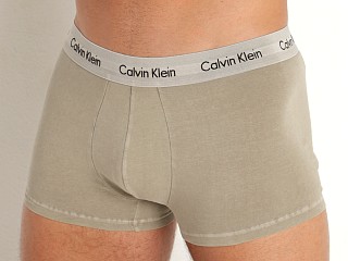 Model in olive Calvin Klein Cotton Stretch Mineral Dye Low Rise Trunk