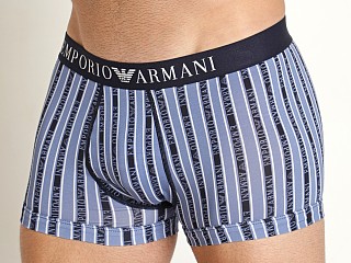 Model in colony blue w/ vertical stripes Emporio Armani All Over Logo Trunk Colony Blue