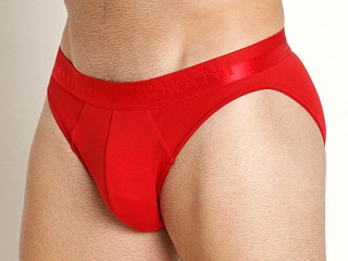 Model in red Emporio Armani Christmas Shiny Logo Brief