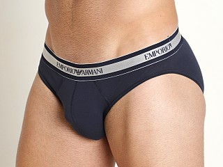 Model in marine Emporio Armani Shiny Logoband Brief