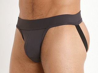 Model in dark grey Tulio Slinky Power Pouch 3-Way Jock Thong