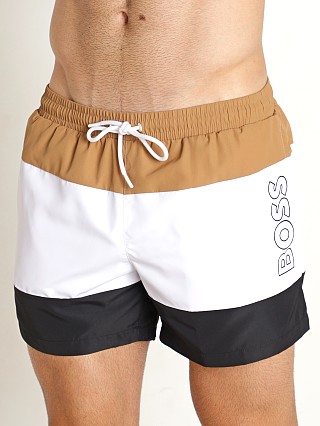 Model in beige/white Hugo Boss Coco Swim Shorts