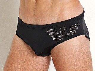 Model in black Emporio Armani Big Eagle Swim Brief