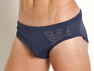 Model in navy blue Emporio Armani Big Eagle Swim Brief