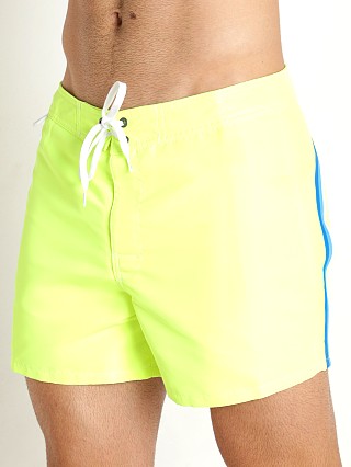 Model in wow yellow Sundek 14" Classic Low-Rise Boardshort