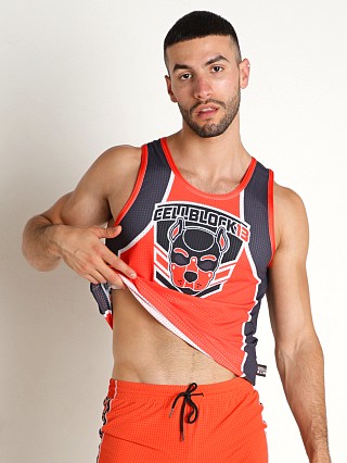 Model in orange Cell Block 13 Kennel Club Spitfire Tank Top