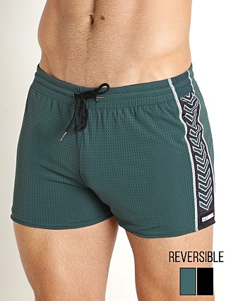 Model in green Cell Block 13 Kennel Club Spitfire Reversible Short