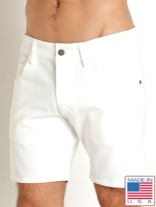 Model in ivory LASC Stretch Jersey 5-Pocket Shorts