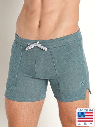 Model in teal LASC Classic Terry 5" Workout Shorts