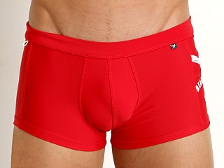 Model in red Tulio Lifeguard Swim Trunk