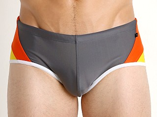 Model in grey/orange/yellow Tulio Bear Pride Swim Brief