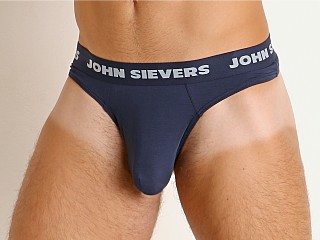 Model in midnight John Sievers SOLID Natural Pouch Thong