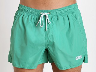 Model in green John Sievers Natural Pouch Swim Shorts