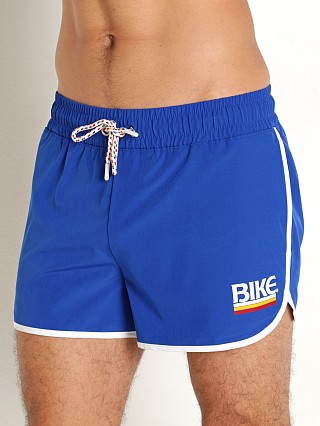 Model in royal Bike Athletic 4-Way Stretch Track Short