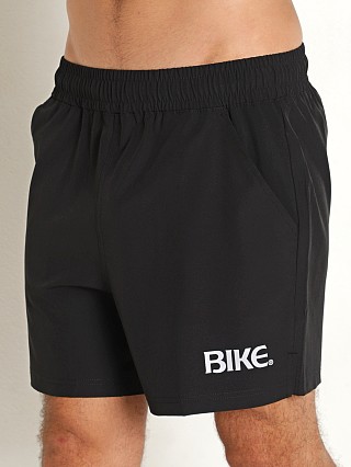 Model in black Bike Athletic 4-Way Stretch Gym Short